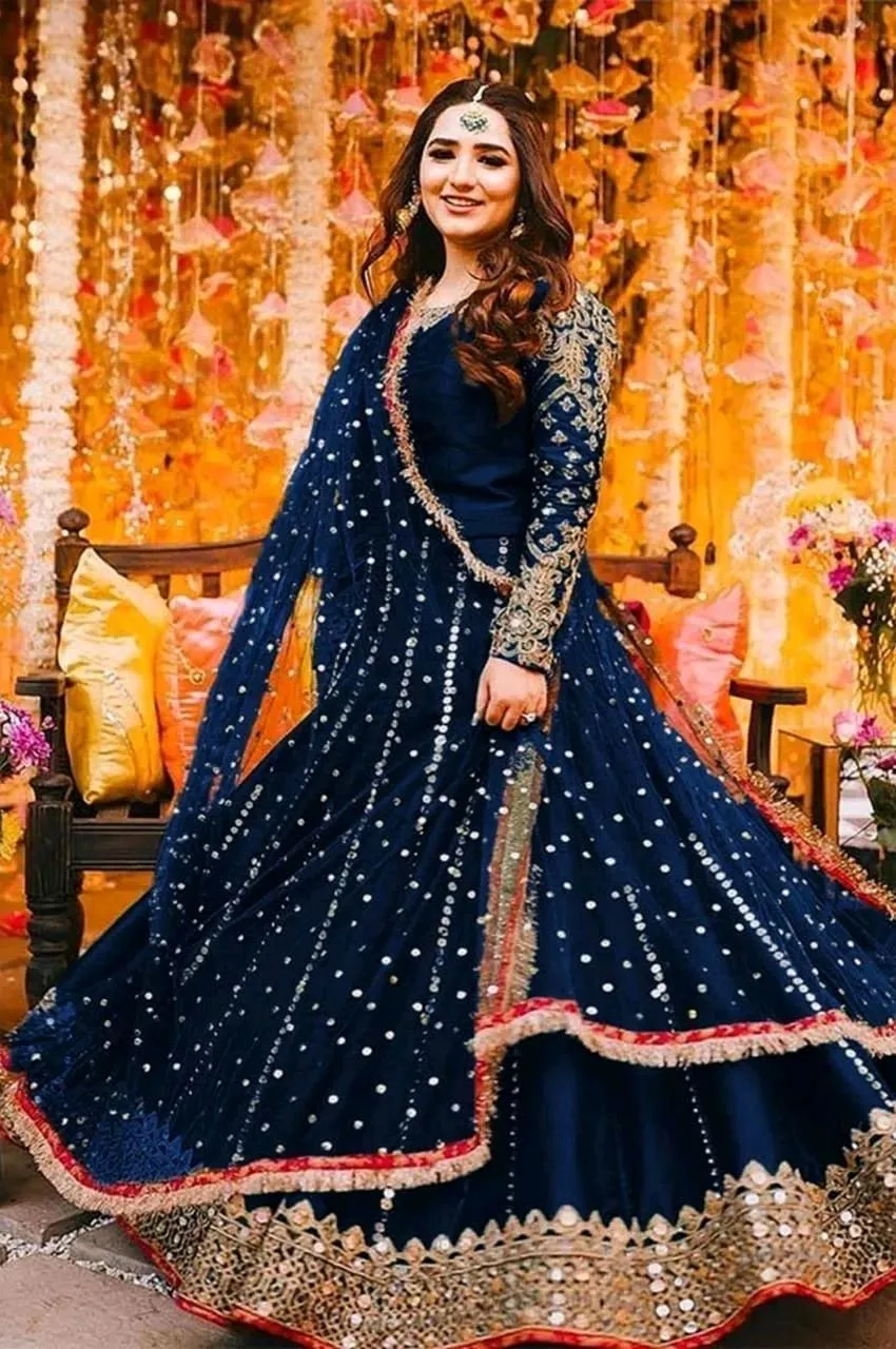 *Product Name*: Blue Shamoz Silk Mirror Work Maxi Suit for Weddings

*Product Details*:Fabric: Shamoz Silk
Pattern: Mirror Work
Neck Type: Round Neck
Available Sizes: Standard Size
Number Of Pieces: 3 Pcs
Package Includes: 1 x Maxi, 1 x Trouser, 1 x Dupat