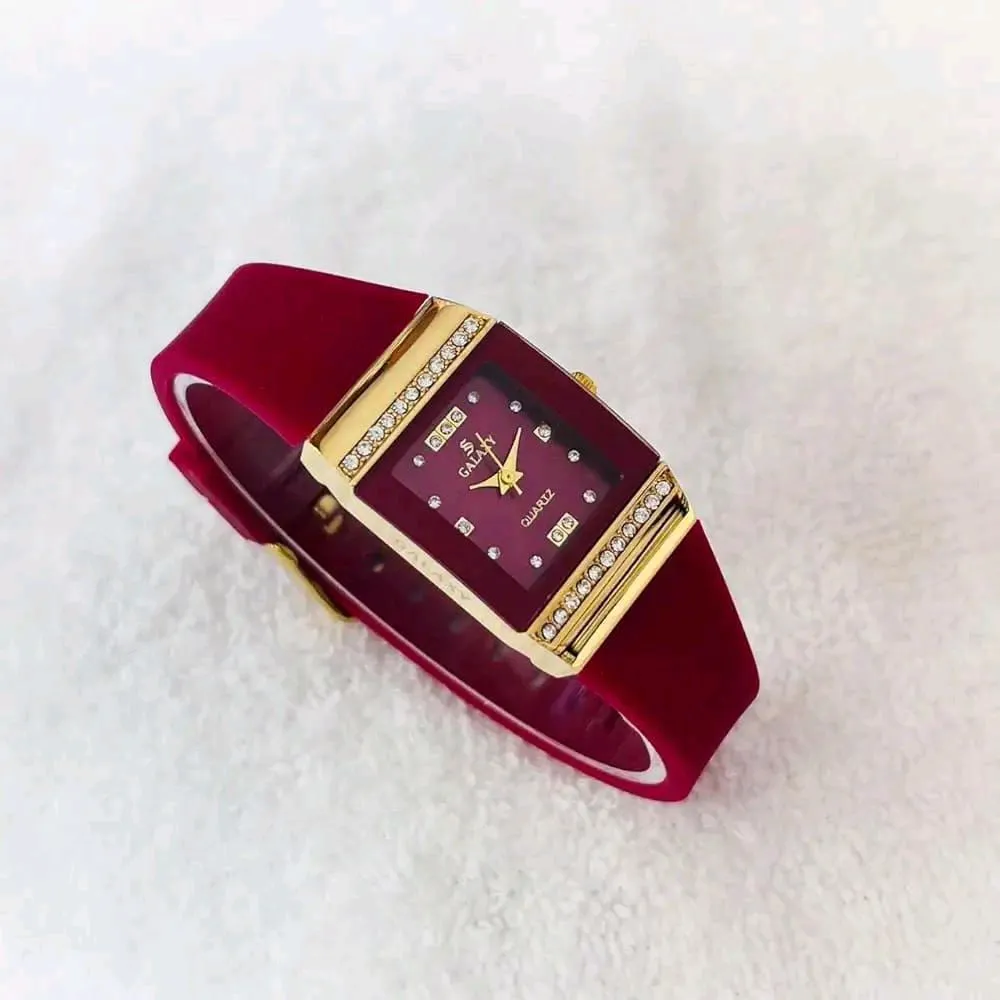 *Product Name*: Women's Red Silicone Diamond Watch with Gold Case
*Product Description*: This elegant watch is perfect for Pakistani women who want a stylish yet practical accessory for daily wear, office, or special events. Its vibrant red silicone band 