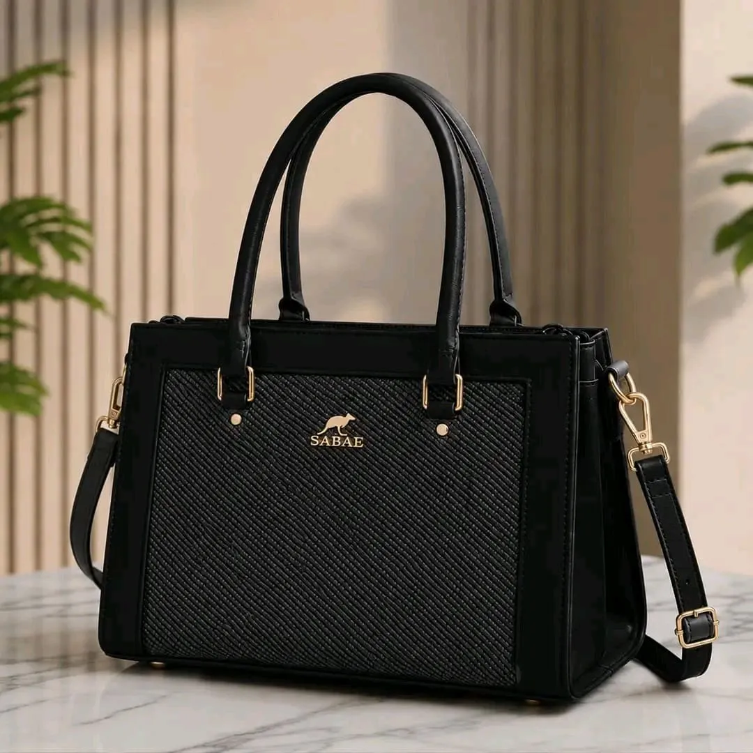 *Product Name*: Premium Women's Structured Handbag| Rexine Top HandleShoulder Bag | Black
*Product Description*: Product Details Brand: Flendy Material: Premium Rexine Size: Medium Dimensions: 11" (Width) × 9" (Height) Style: Structured Top Handle Handbag