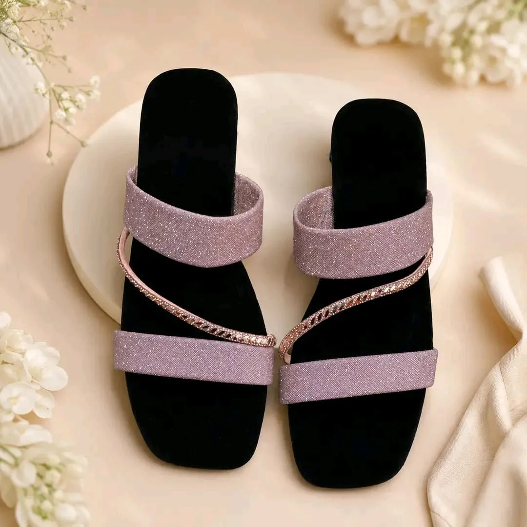 *Product Name*: Stylish New Fancy Women's Slippers High Quality 
*Product Description*: 
*Product Details*:Material: Rexine
Pattern: Glitter
Gender: Women's
Product Feature: Fancy
Available Sizes: 7, 8, 9, 10
Size Chart: Size Chart Attached
Package Includ