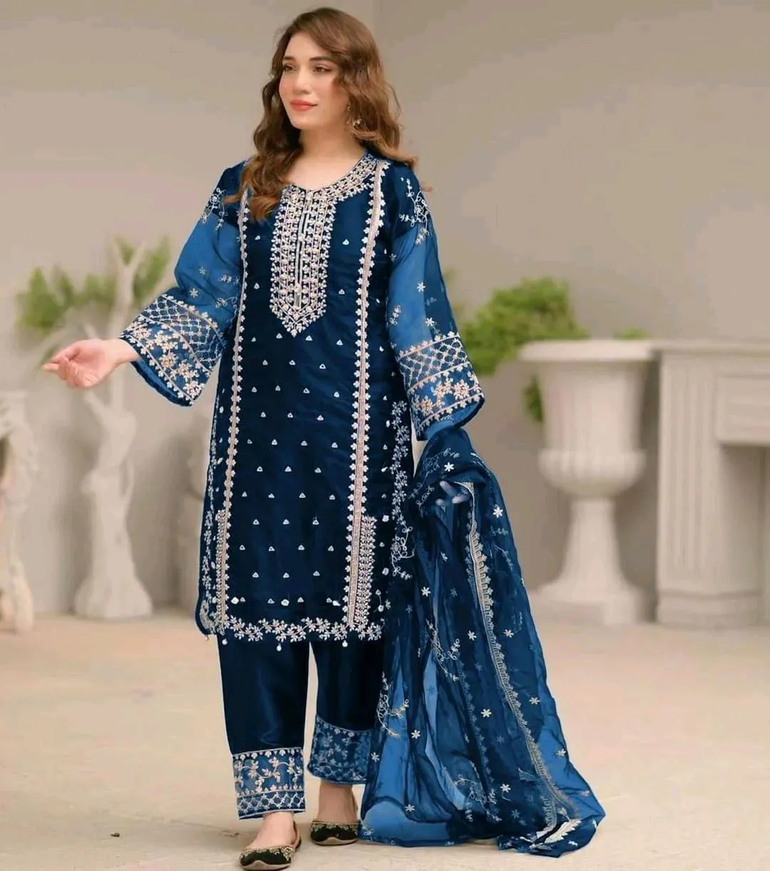*Product Name*: Blue Embroidered 3-Piece Suit for Women
*Product Description*: This stunning 3-piece suit is perfect for Eid, weddings, or any festive occasion where you want to look elegant and comfortable. The rich blue organza fabric with intricate whi