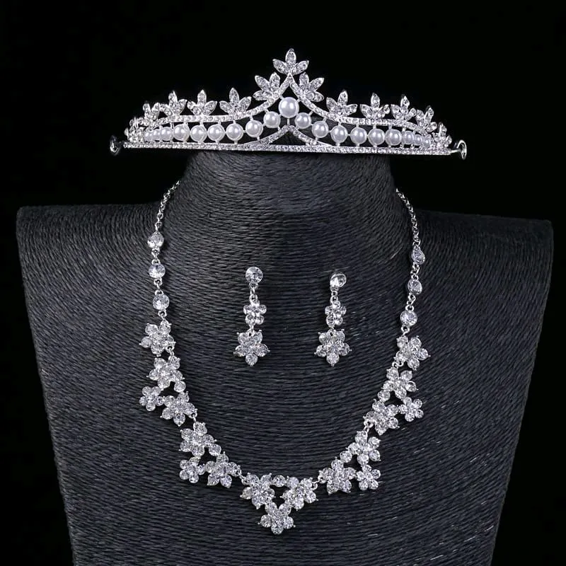 *Product Name*: Pakistani Bridal Crown Necklace Earrings Set with Rhinestones
*Product Description*: This stunning three-piece bridal jewelry set is perfect for Pakistani brides looking for a touch of elegance without breaking the bank. Designed for weddi