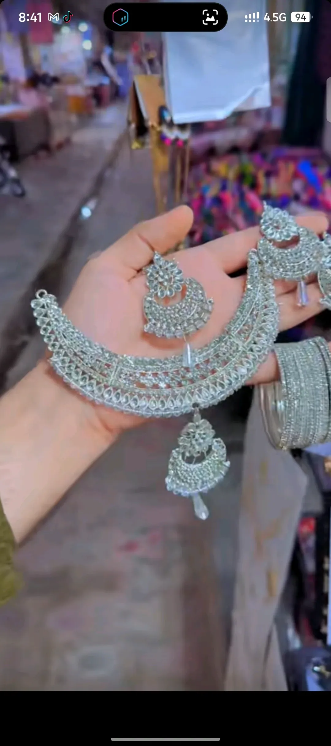 Gold Plated Bridal Set with Crystal Accents
*Product Description*: This stunning bridal set is perfect for Pakistani brides looking for a luxurious yet affordable option for their special day. Designed with intricate floral patterns and sparkling crystals